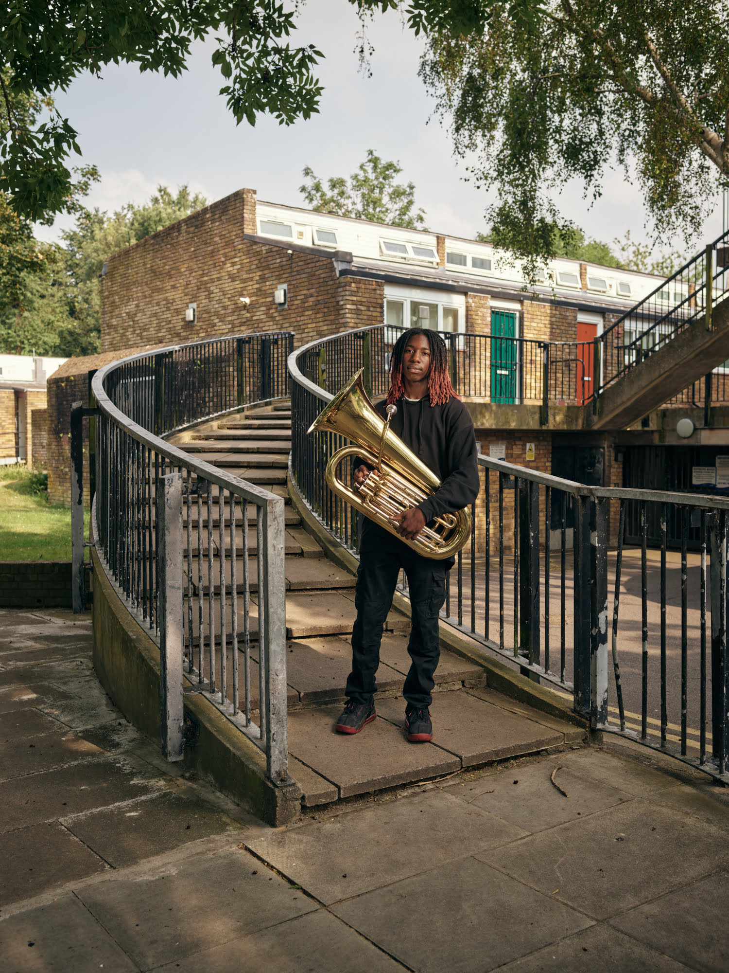 Teigan Hastings, Cressingham Gardens Estate. A self-taught player and remarkably assured young man, Teigan joined BCO for the Summer Estates Tour 2021, age just 15, after seeing the roving band performing down his street and asking to audition. He hopes to join the Navy and become an engineer.