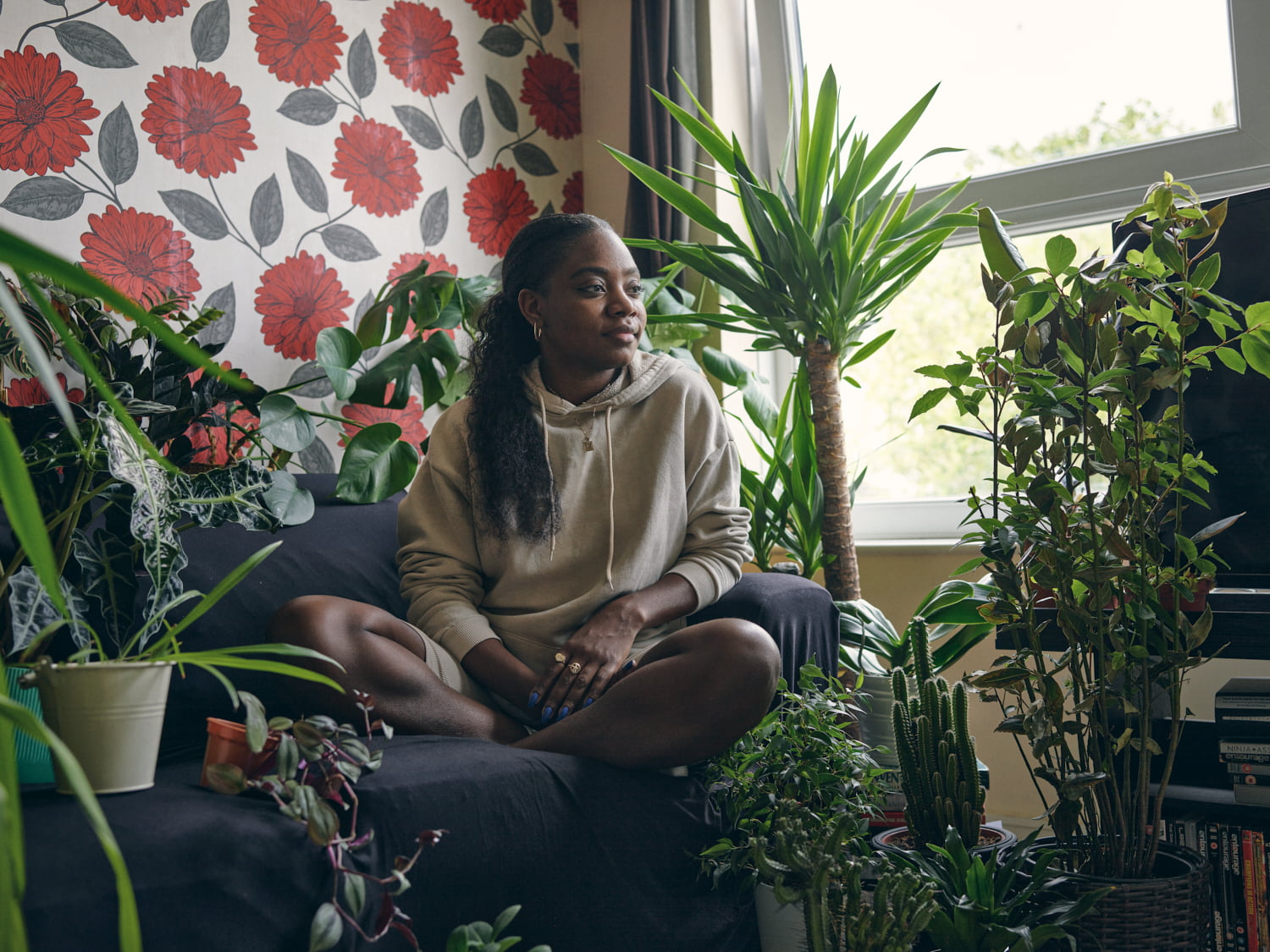 Danielle at home with her plants