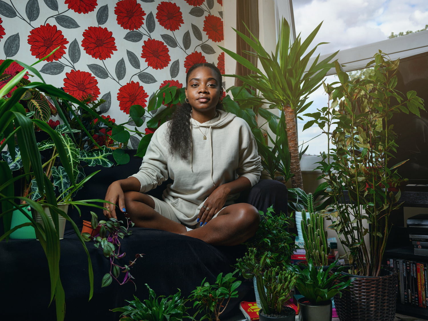 Danielle, at home with her plants