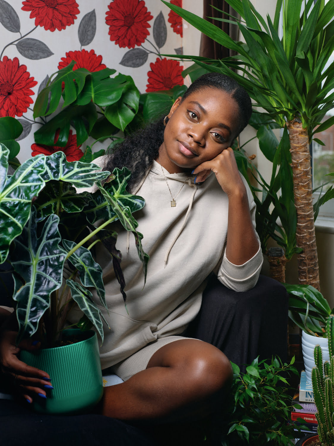 Danielle at home with her plants